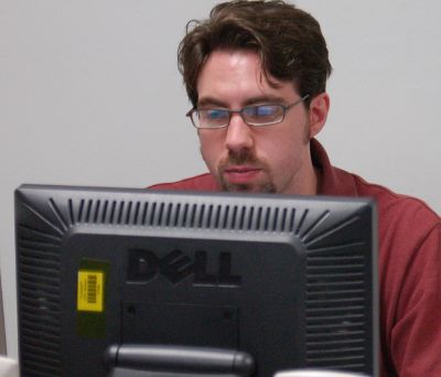 me working behind a LCD monitor